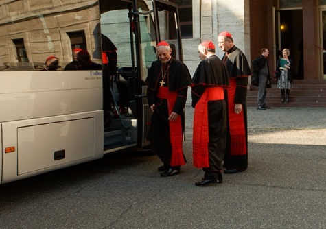 Cardinals Donald Wuerl, Daniel DiNardo and Roger Mahony board a bus at Pontifical North American College in Rome on their way to a final meeting with Pope Benedict XVI February 28, 2013. Pilot photo/Gregory L. Tracy