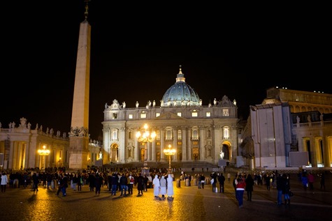 People gather in St. Peter's Square at 8 PM Feb. 28, the time when the period of Sede Vacante began.  Pilot photo/Gregory L.  Tracy